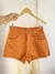 Short jeans cor abóbora com aplicacoes - comprar online