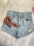 Short jeans 2 botões acompanha cordinba - loja online