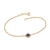 Pulseira rommanel folheada a ouro com pingente flor de zircônias Azul escuro