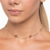 Choker rommanel folheada a ouro com tírculos na internet
