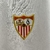 Camisa Sevilla I 24/25 Torcedor Castore Masculina - Branca e Vermelha - Invictus Artigos Esportivos