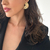 BRINCO LEQUE GRANDE BANHADO A OURO 18K - comprar online