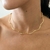 CHOKER ONDULADA BANHADA A OURO 18K na internet