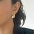 BRINCO VÍRGULA P BANHADO A OURO 18K - loja online