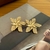 BRINCO FLOR ORGÂNICA NUDE P BANHADO A OURO 18K - loja online