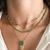 COLAR PINGENTE CRISTAL ESMERALDA FRANJA BANHADO A OURO 18K