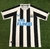 Camisa Newcastle Home 22/23 Masculina Castore Torcedor - Preto e Branco na internet