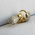 Brinco argolinha com zircônias banhado a ouro 18k