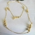 Colar longo de 80 cm com esferas banhado a ouro 18k