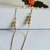 Colar longo de 80 cm com esferas banhado a ouro 18k