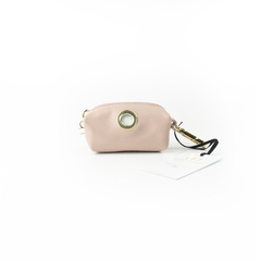 porta saquinhos importado de luxo em couro nude com acabamento dourado para animal de estimação