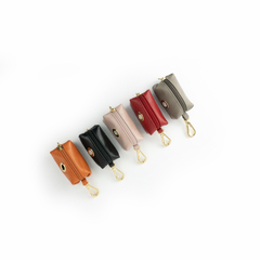  porta saquinhos importado de luxo em couro vermelho com acabamento dourado para animal de estimação