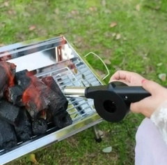 Soplador avivador de asado