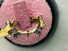 ANILLO SIN GARANTIA DE FLORES MORADAS