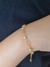Pulseira Infantil Banhada a Ouro com Mini Pérolas e Estrelas Vazadas na internet
