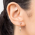 Brinco folheado a ouro 18k com zircônias e pérolas - comprar online