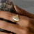 Anel Fileira Cravejada Efeito Escovado Banhado a Ouro 18K - comprar online