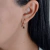 Brinco Gota Zircônia Lilás banhado a Ouro 18K - comprar online