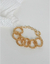 Brinco dourado com textura em correntaria - comprar online
