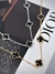 Choker trevo black dourado na internet