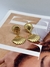 Brinco concha duplo dourado