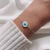 Pulseira Prata Olho Grego em Madre Perola