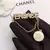 Broche Versaces