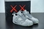 Nike KAWS x Air Jordan 4 Retro 'Cool Grey'