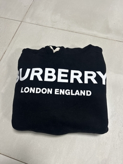 Buzo Burberry. en internet
