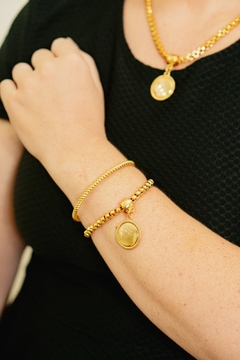 Pulseira com medalha, escrito ensinar é lapidar o futuro - comprar online