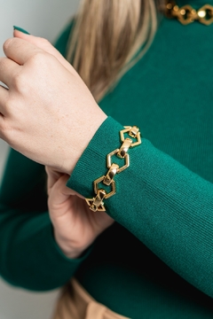 Pulseira em losangulos na cor ouro