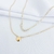 COLAR DUPLO COM REDONDO LISO E TRIO ZIRCONIAS