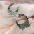 Brinco luxo flores cravejadas - loja online