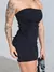 Conjunto blusa assimétrica + saia Preto na internet