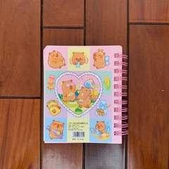 Libro tapa dura con agua adentro y brillo de Stickers de Capibara - Al Azar - en internet