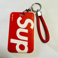 -*Portasube con Soga de Supreme - Fondo Rojo