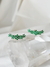 Brinco estilo earcuff com zirconias verdes na internet