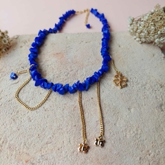 COLAR HOWLITA ROXA PINGENTE BORBOLETA