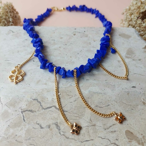 COLAR HOWLITA ROXA PINGENTE BORBOLETA