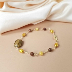 PULSEIRA PÉROLA AMARELA na internet