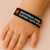 Pulseira de identificação personalizada com nome e alerta médico bordado – ideal para emergências e condições de saúde específicas.