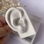 Piercing coração com zircônia na internet