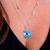 Pingente De Prata Coração Liso Olho Grego e Coração Com Resina Azul - comprar online
