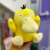 Pelúcia Psyduck Pokémon - comprar online