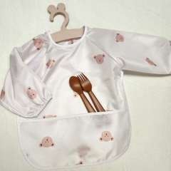Babero impermeable con mangas - tienda online