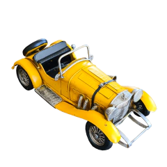 Carro conversível de metal amarelo, perfeito para adicionar sofisticação e charme à decoração de qualquer ambiente.