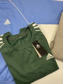 Buzo Adidas retro verde en internet