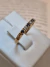 Anel Meia Aliança em Ouro 18K com Pedras Safiras e Diamante Natural - comprar online
