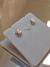 Par de brincos com 7 diamantes em Ouro 18K na internet