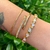 BRACELETE FIO (primeiro da esquerda) - comprar online